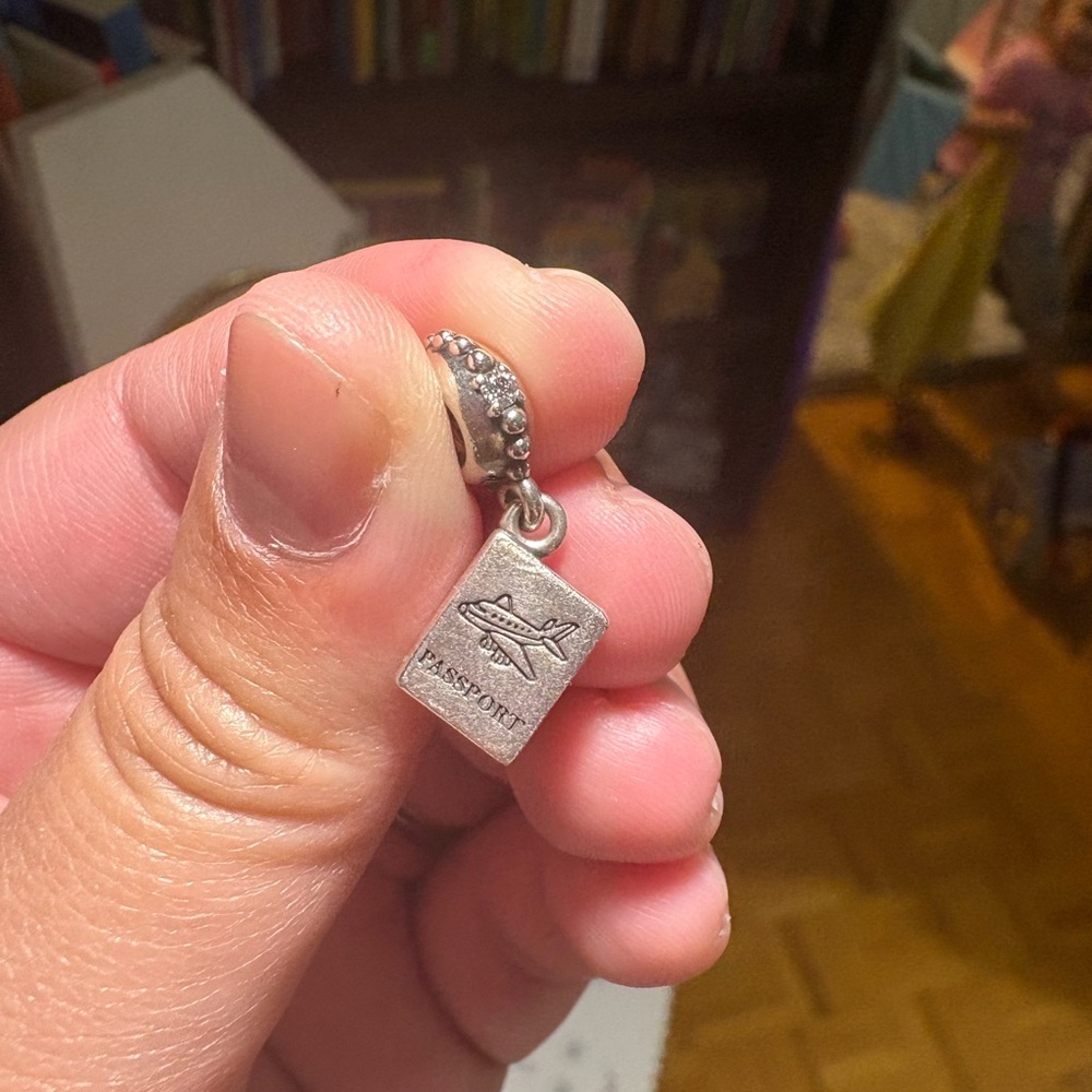Pandora passport charm